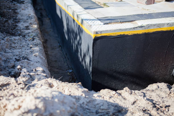 Professional Waterproofing technician working in Spring Valley, IL